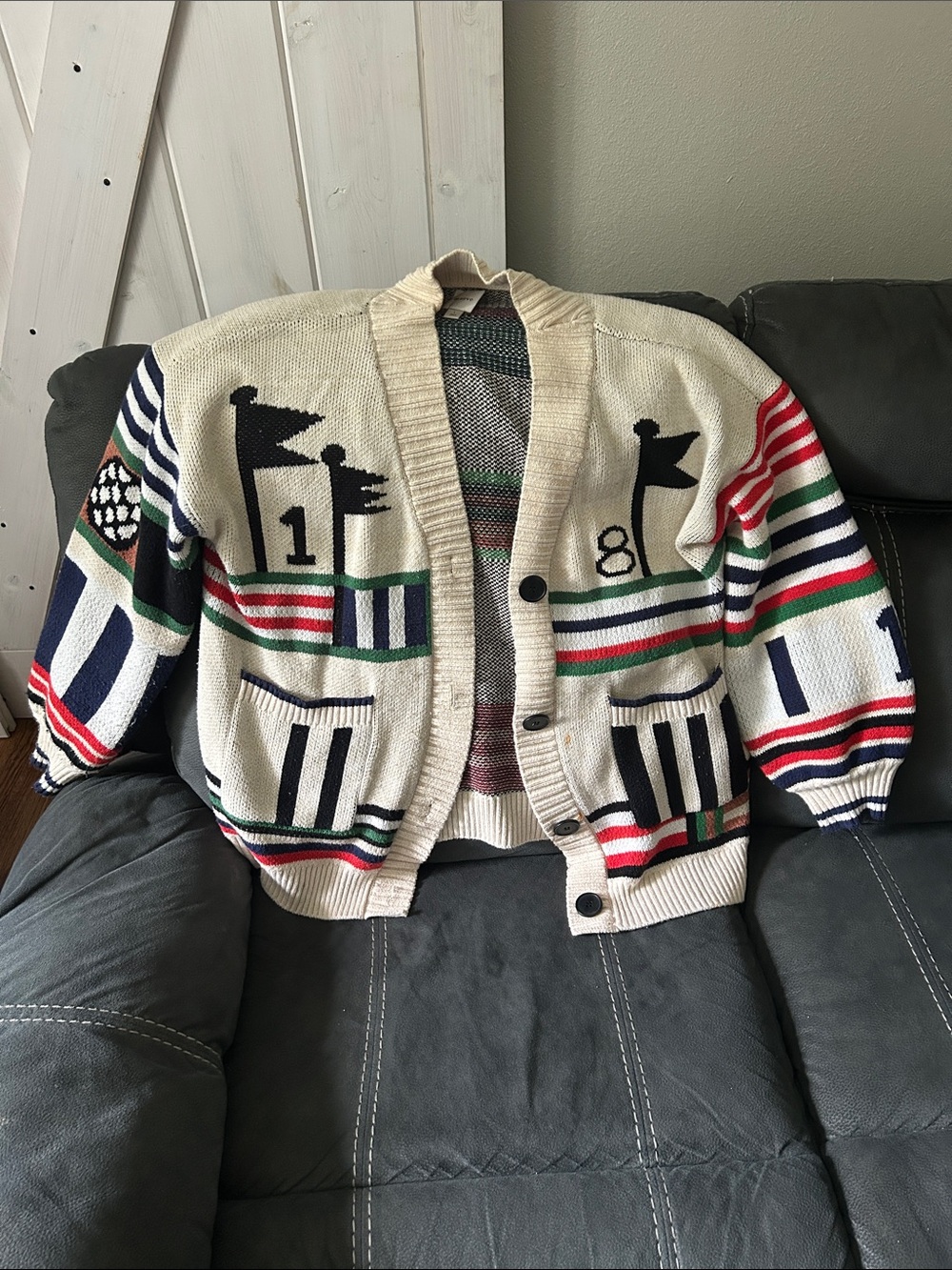 Maeve Cream Golf Cardigan sweater with Red, Green, Navy & Black Stripes